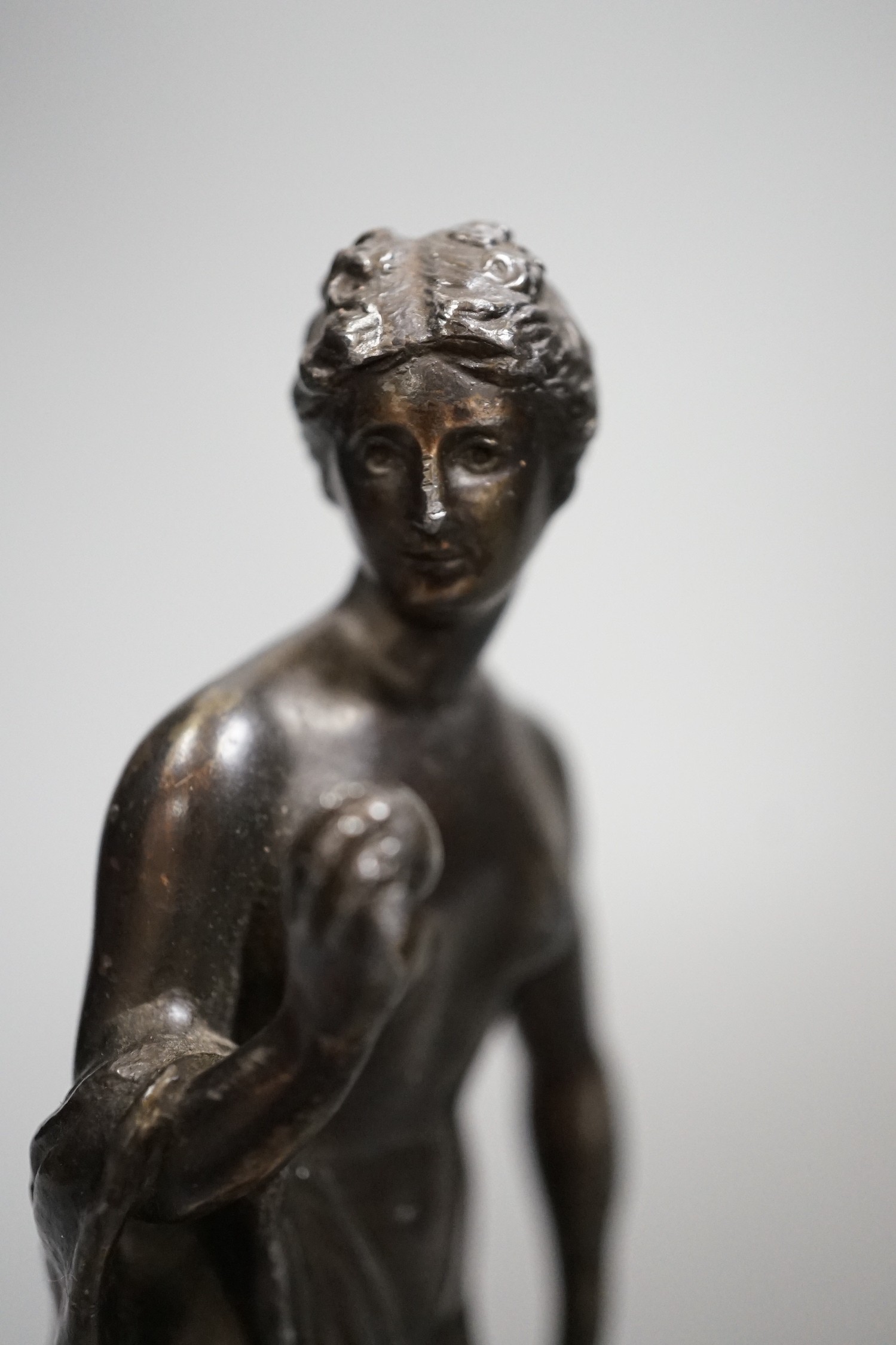 A bronzed spelter figure 'Eve', 20cm high